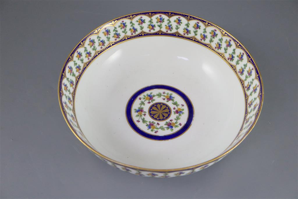 A Sevres hard paste porcelain salad bowl, c.1792, painted by Guillaume Noel (1755-1804) 25.3cm diameter